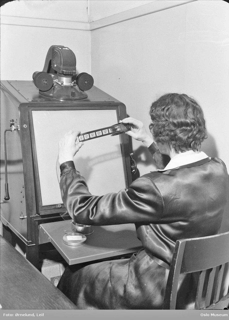 A microfilm reader, from a photograph taken in 1953 at the National Archives of Norway when they were housed at Bankplassen&hellip;
